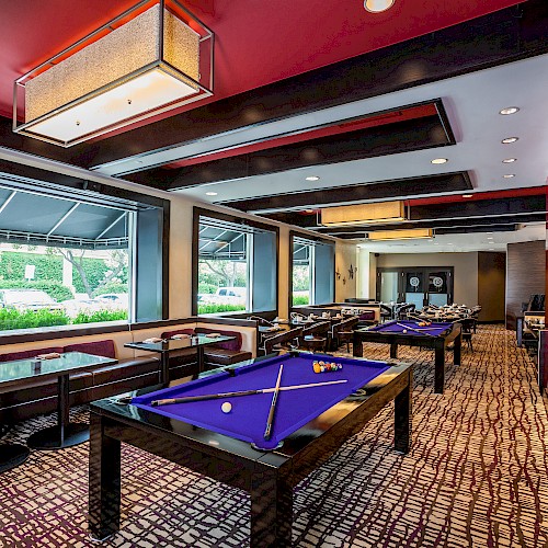 Play Billiards at Hotel Derek's Pool Tbales